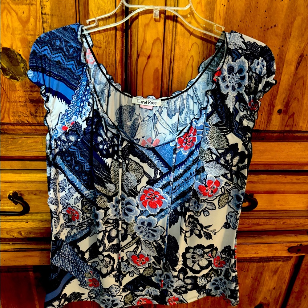 Blue print with red accents in flower prints.